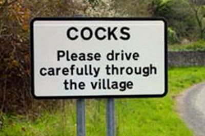 cocks funny road sign