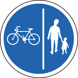 Path for cyclists and pedestrians divided is compulsory - Road Sign