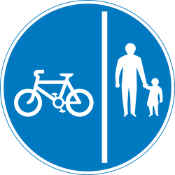 Path for cyclists and pedestrians divided is compulsory - Road Sign