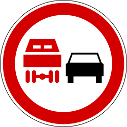 Overtaking prohibited for trucks - Road Sign