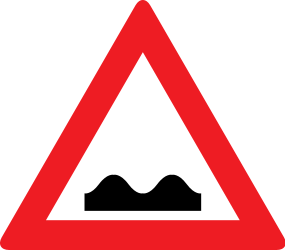Poor road surface ahead - Road Sign