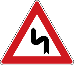 منحنى مزدوج للأمام ، إلى اليسار ثم إلى اليمين - علامة الطريق
