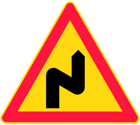 Road bends right then left - Road Sign