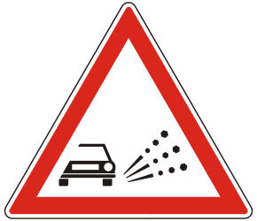 Loose chippings and stones on the road warning - Road Sign
