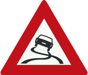 Slippery road surface ahead - Road Sign