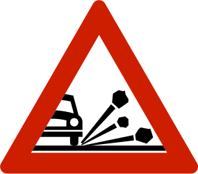 Loose chippings and stones on the road warning - Road Sign