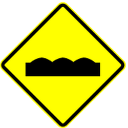 Poor road surface ahead - Road Sign