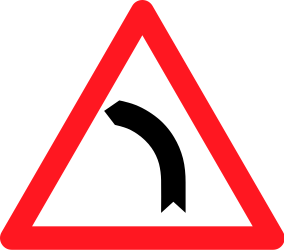 Road ahead curves to the left side - Road Sign