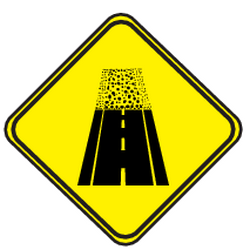 Warning for an unpaved road surface - Road Sign