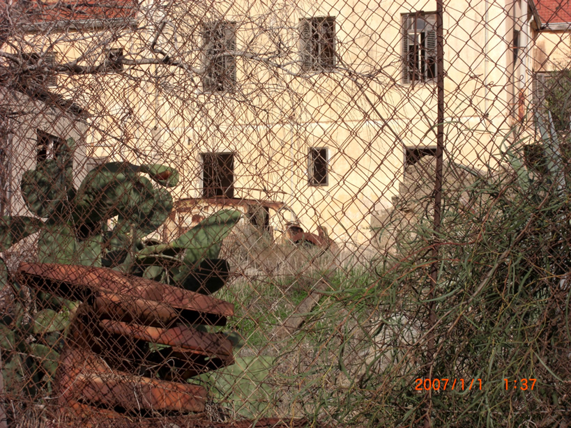 Old Van Inside Fence